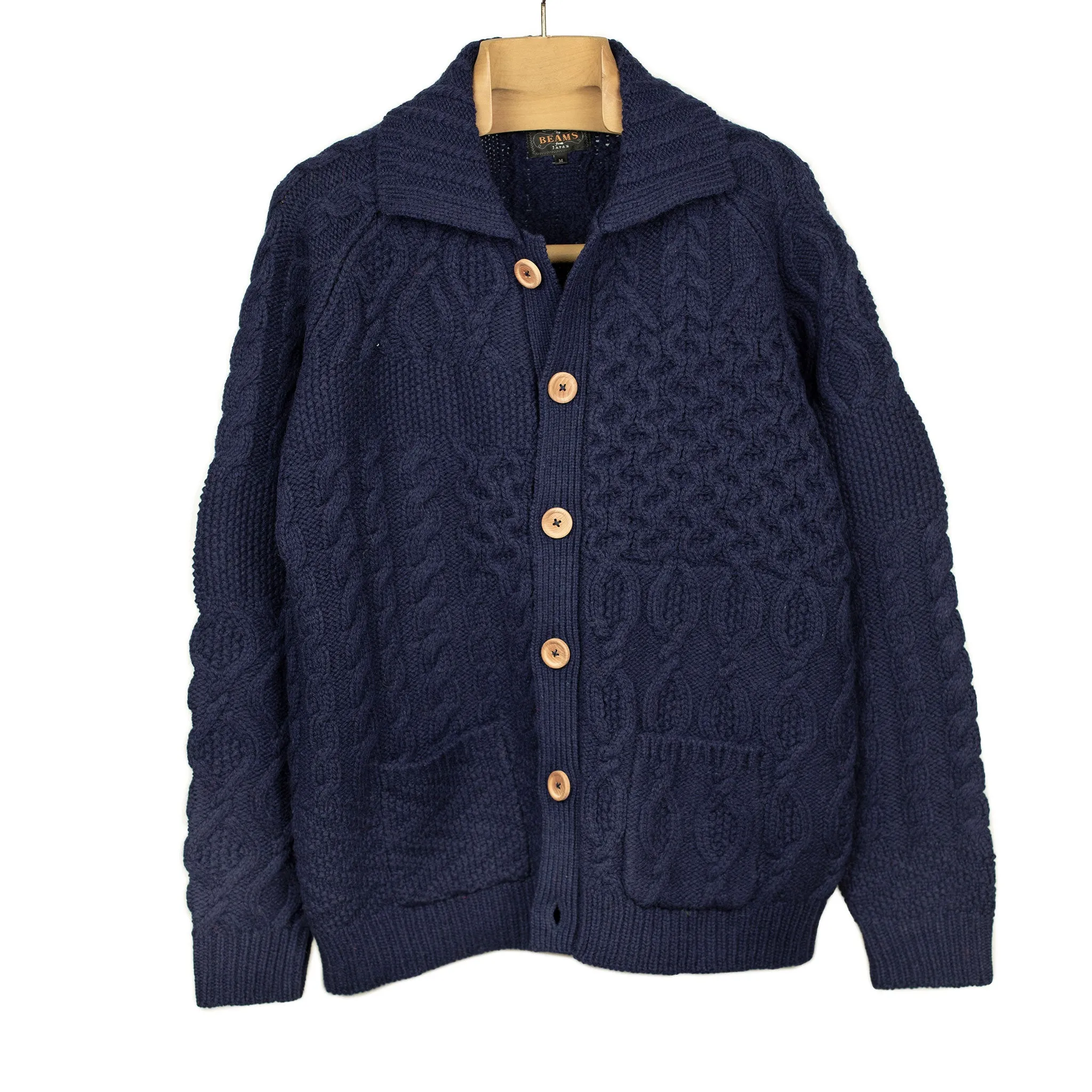 Crazy cable knit Aran cardigan in navy wool